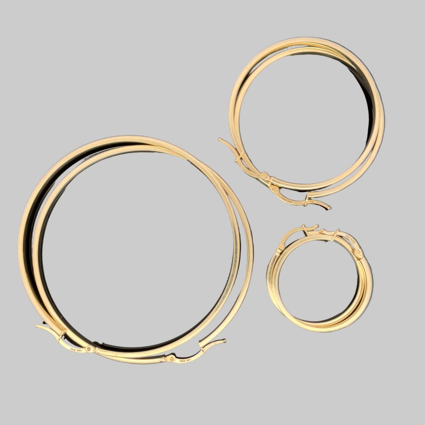 Arracadas grandes con elegante diseño plano