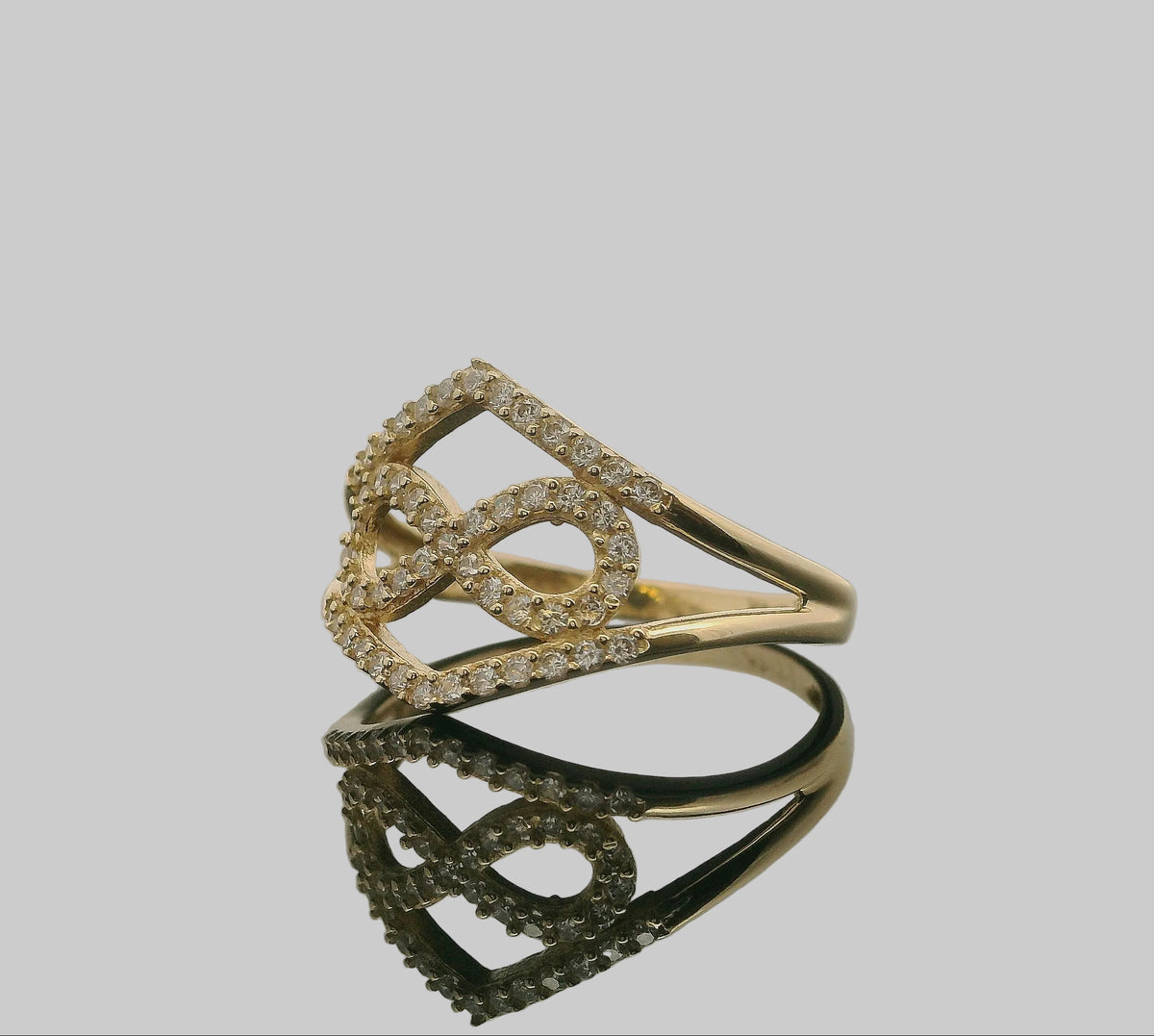ANILLO DE ORO AMARILLO INFINITO CON PIEDRAS Y DISEÑO DOBLE 14K