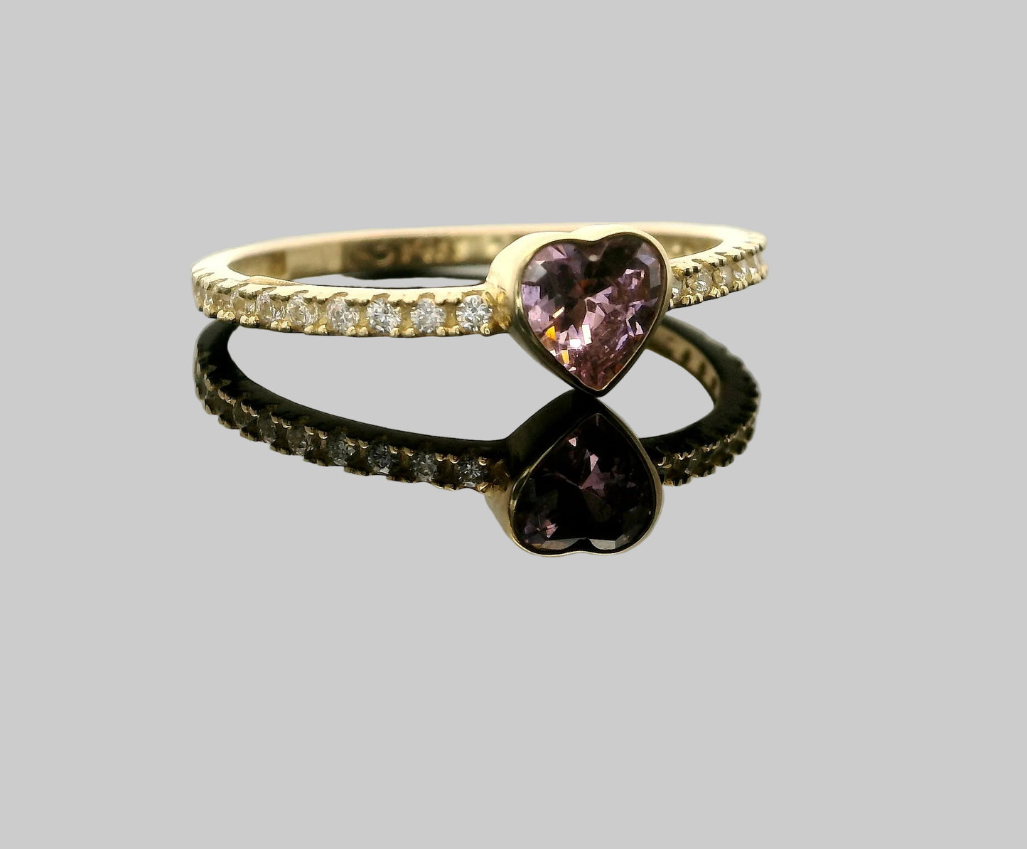 Anillo piedra corazón central