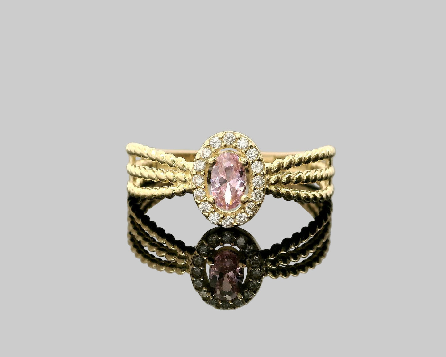 Anillo tres hileras piedra al centro