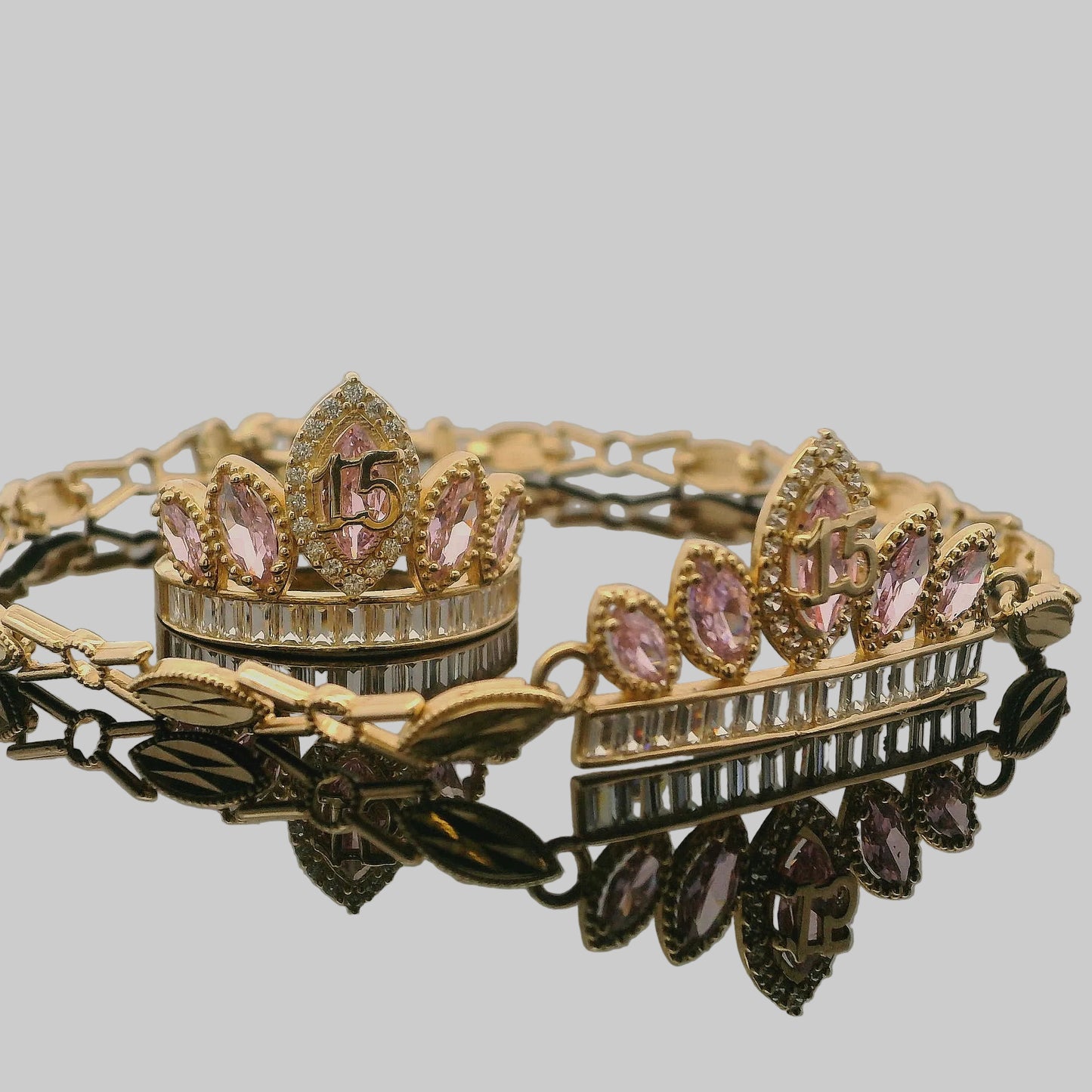 QUINCEAÑERA CORONA Y BRAZALETE CON PIEDRAS ROSA