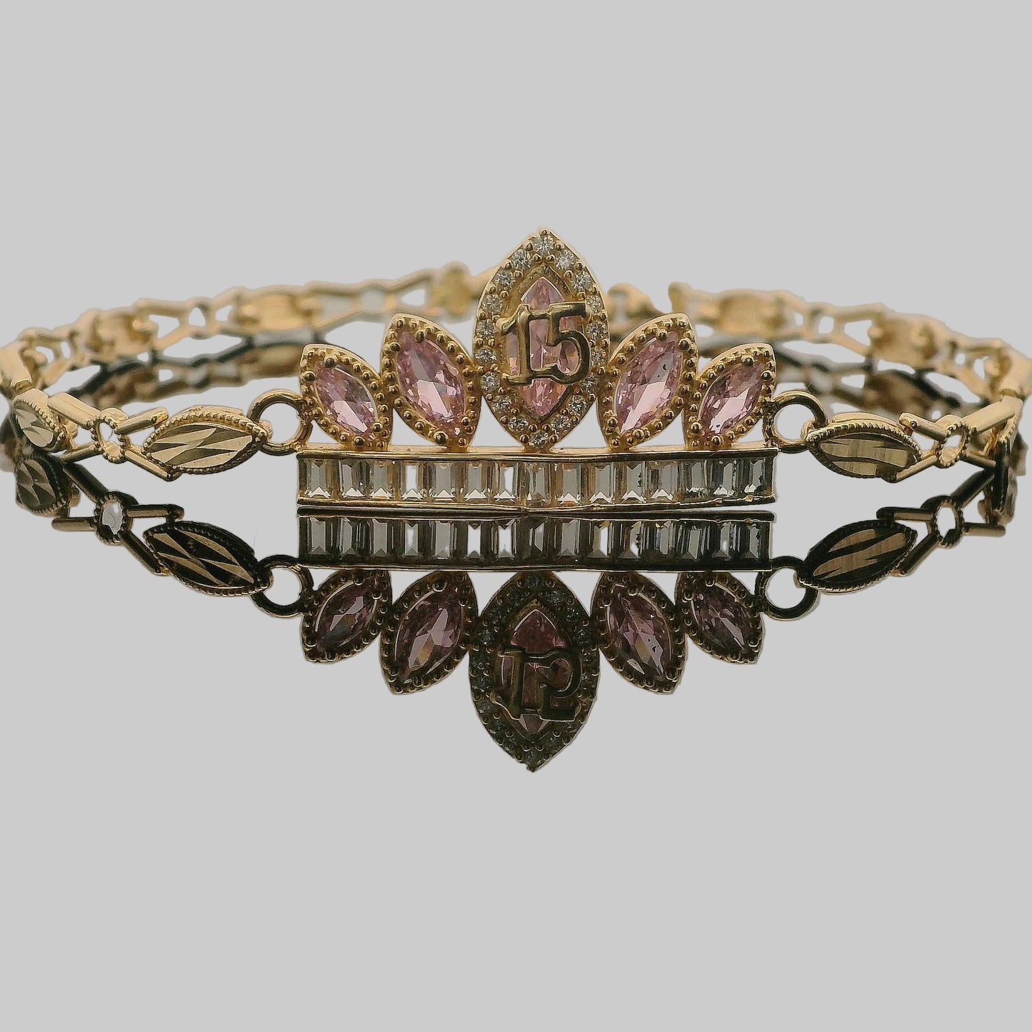 QUINCEAÑERA CORONA Y BRAZALETE CON PIEDRAS ROSA