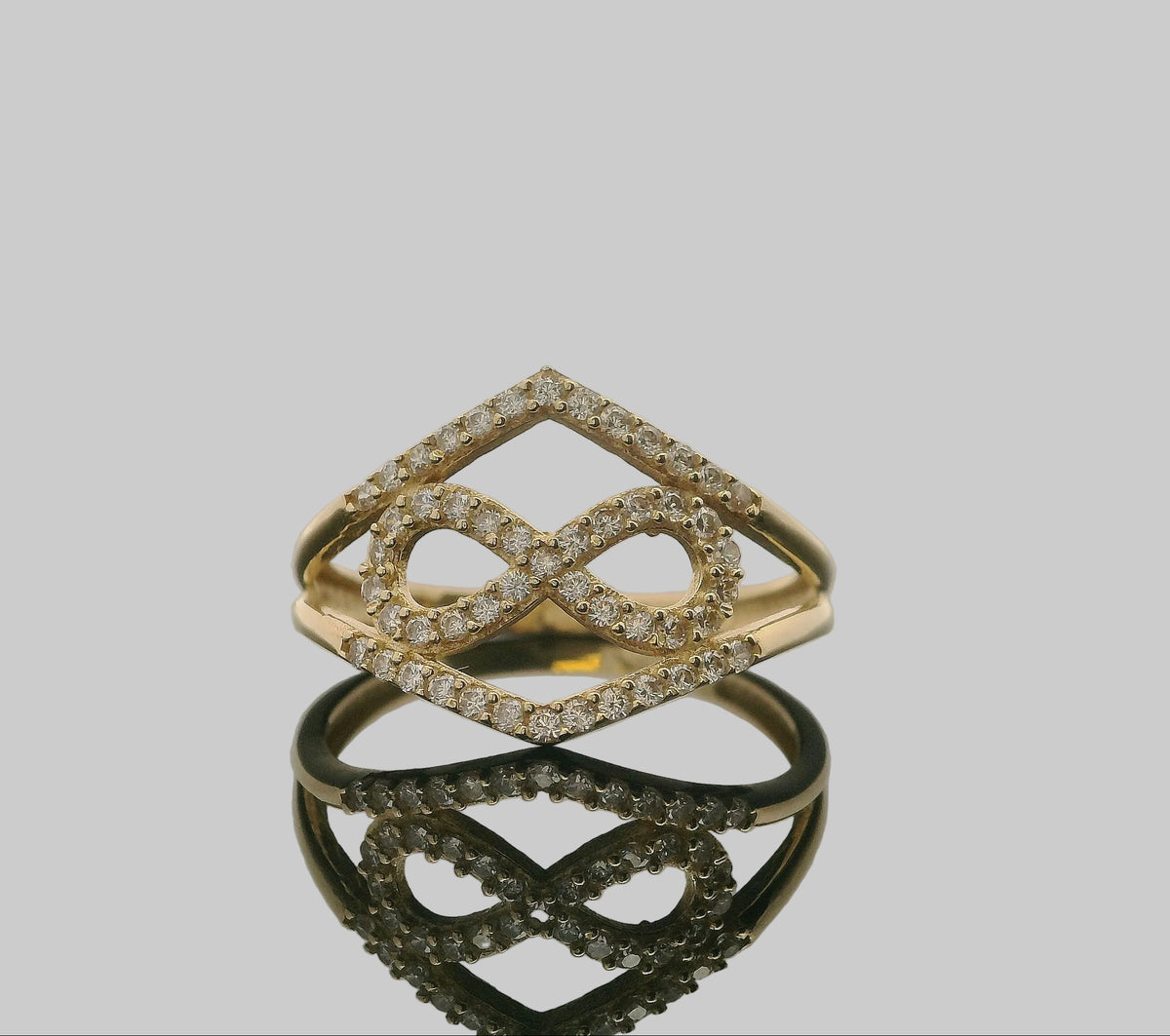 ANILLO DE ORO AMARILLO INFINITO CON PIEDRAS Y DISEÑO DOBLE 14K