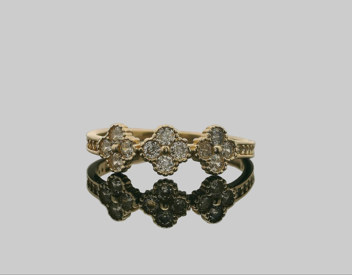 ANILLO DE ORO AMARILLO CON TRES FLORES Y PIEDRAS 14K