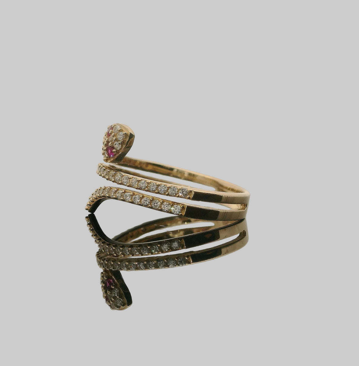 ANILLO DE ORO DISEÑO SERPIENTE CON PIEDRAS ROSAS 14K