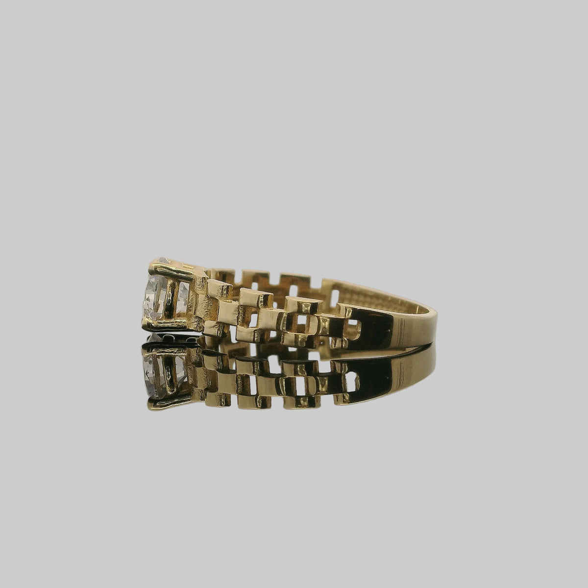 ANILLO DE ORO CON PIEDRA CENTRAL REDONDA 14K