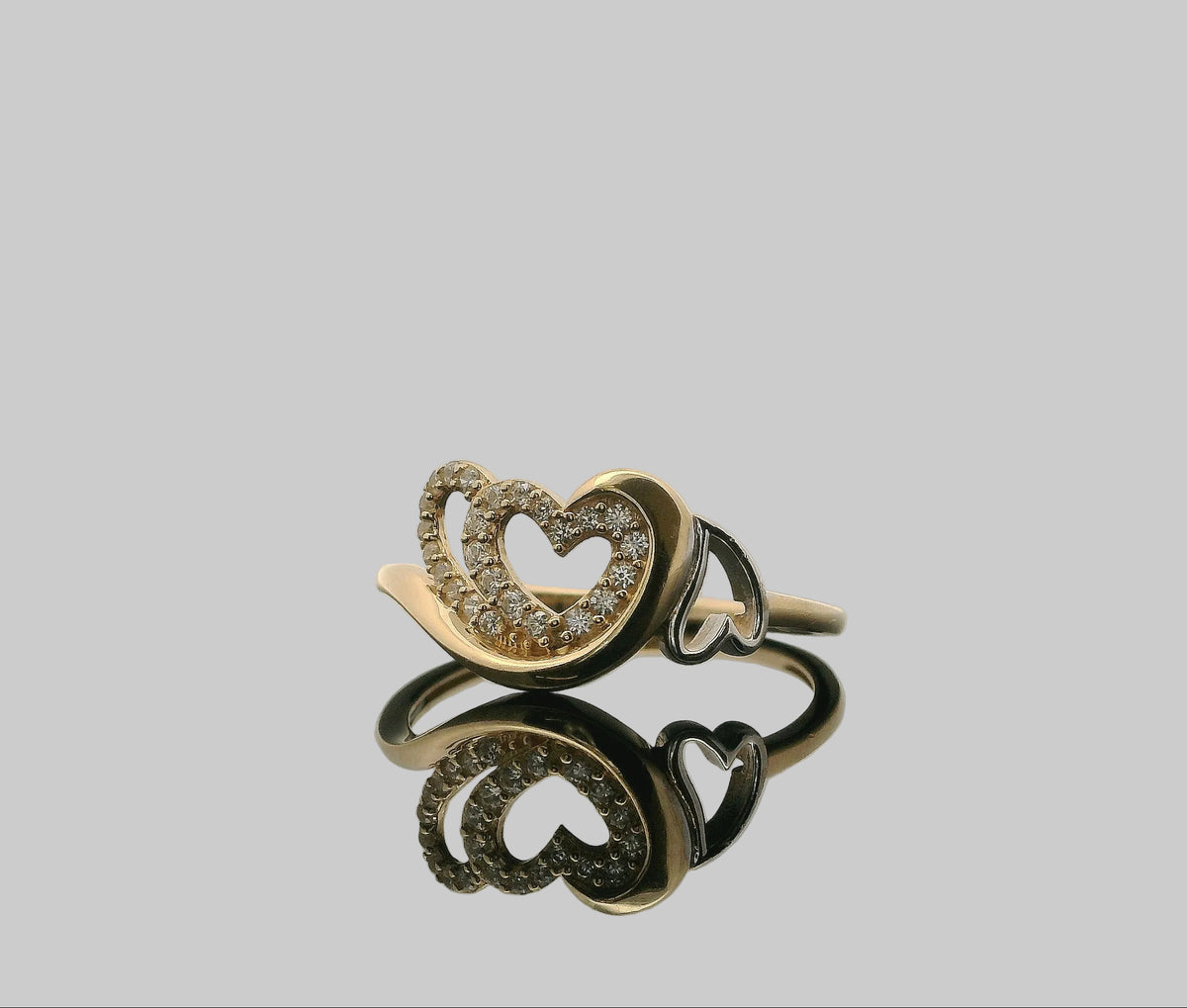 ANILLO DE CORAZON Y MEDIO EN ORO CON ZIRCONIAS 14K